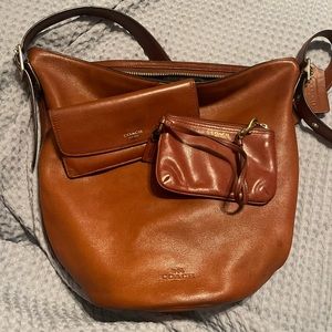 Large brown leather bucket bag with wristlet and wallet